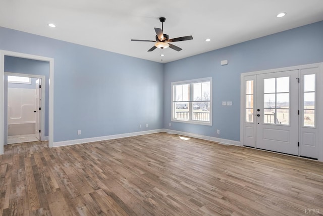 2135 Bellevue Rd, Forest, VA 24551 - spare room with wood finished floors, ceiling fan, and recessed lighting