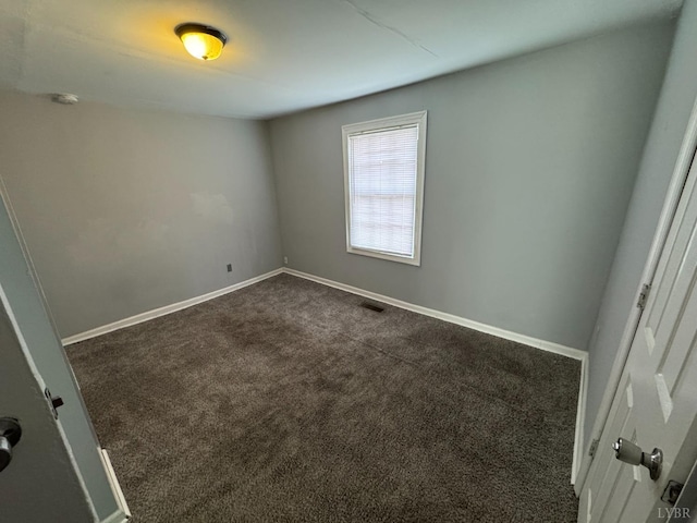 800 Spring St, Lynchburg, VA 24504 - unfurnished room featuring dark colored carpet and baseboards
