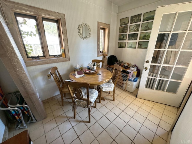 dining space with tile patterned floors