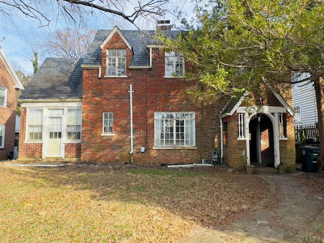 807 Pershing Ave, Lynchburg, VA 24503 - view of front of property with a chimney, brick siding, and a front lawn