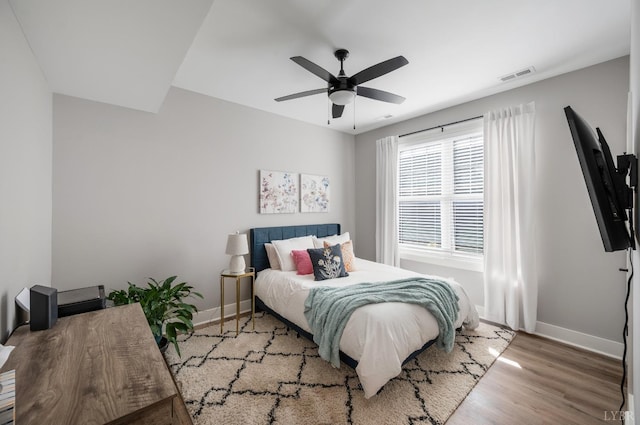 706 Elmwood Ave, Lynchburg, VA 24503 - bedroom featuring ceiling fan, baseboards, visible vents, and wood finished floors