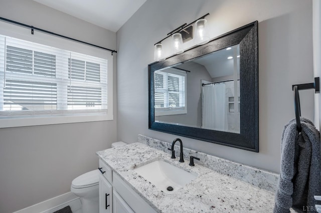 706 Elmwood Ave, Lynchburg, VA 24503 - full bath with vanity, plenty of natural light, baseboards, and toilet