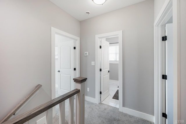 706 Elmwood Ave, Lynchburg, VA 24503 - corridor with light carpet, an upstairs landing, and baseboards