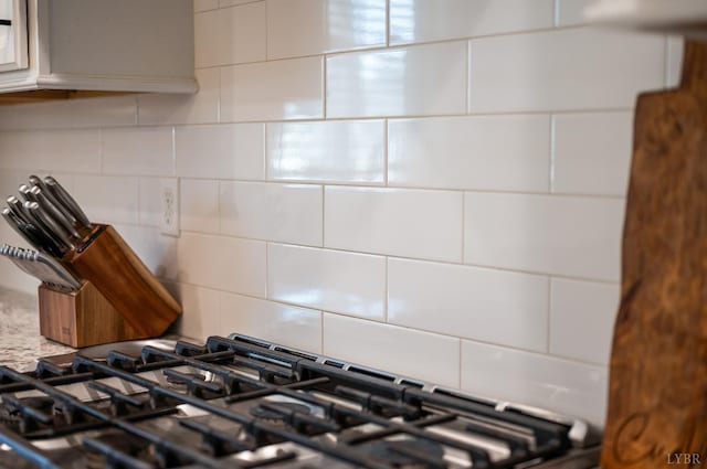 706 Elmwood Ave, Lynchburg, VA 24503 - details with backsplash, cooktop, and light countertops