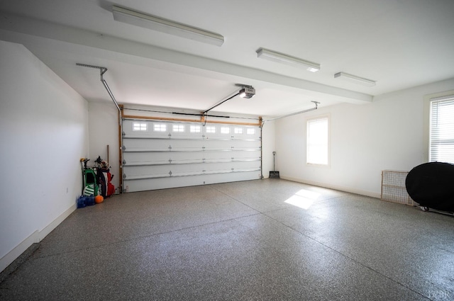 706 Elmwood Ave, Lynchburg, VA 24503 - garage featuring baseboards and a garage door opener