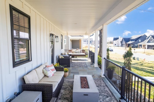 706 Elmwood Ave, Lynchburg, VA 24503 - view of patio featuring an outdoor living space with a fire pit, a porch, and a residential view
