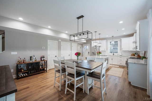 706 Elmwood Ave, Lynchburg, VA 24503 - dining space featuring light wood finished floors and recessed lighting