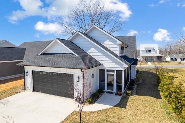 706 Elmwood Ave, Lynchburg, VA 24503 - view of front of house featuring an attached garage, a front yard, a shingled roof, and driveway