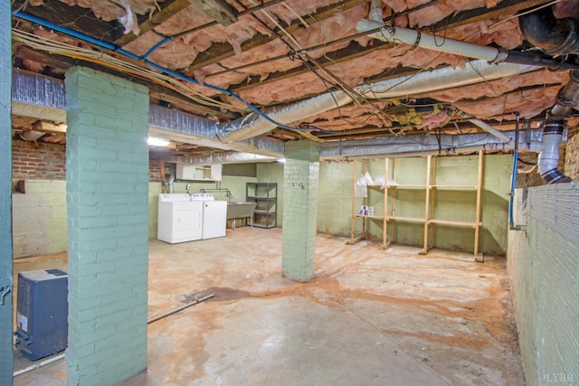 226 Denver Ave, Lynchburg, VA 24503 - unfinished below grade area featuring washer and clothes dryer and a sink