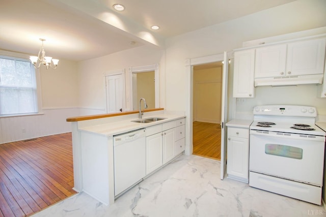 226 Denver Ave, Lynchburg, VA 24503 - kitchen with a sink, white cabinets, white appliances, under cabinet range hood, and a chandelier
