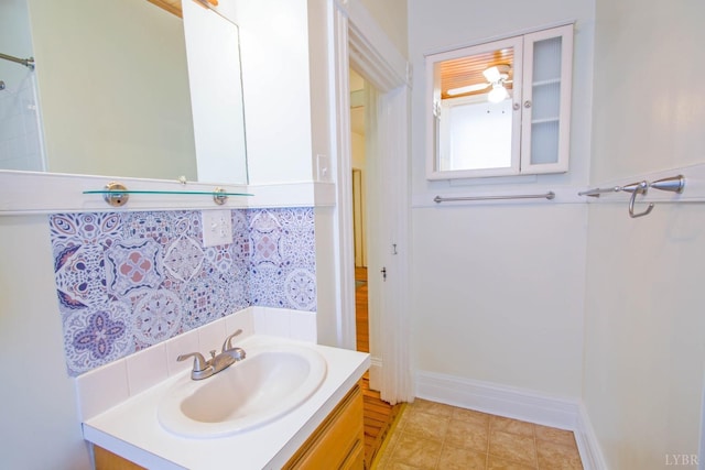 226 Denver Ave, Lynchburg, VA 24503 - bathroom with vanity, decorative backsplash, and baseboards