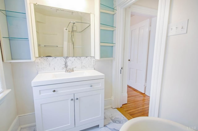 226 Denver Ave, Lynchburg, VA 24503 - bathroom with curtained shower, marble finish floor, vanity, and backsplash