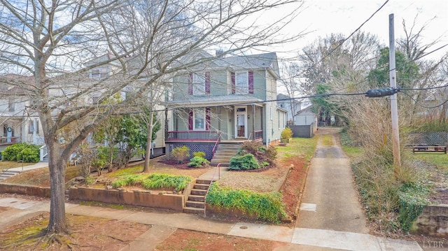 226 Denver Ave, Lynchburg, VA 24503 - view of front of property featuring stairway, concrete driveway, and a porch