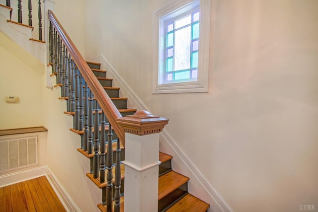 226 Denver Ave, Lynchburg, VA 24503 - stairs featuring baseboards, visible vents, and wood finished floors