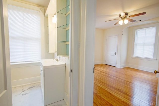 226 Denver Ave, Lynchburg, VA 24503 - interior space featuring vanity, baseboards, wood finished floors, and a ceiling fan