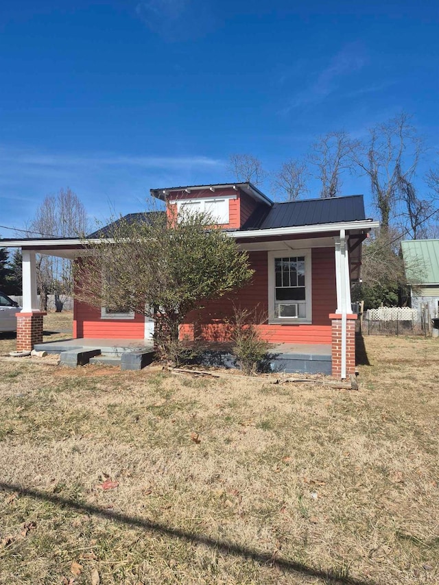 2608 Old Forest Rd, Lynchburg, VA 24501 - view of front of home featuring covered porch, a front yard, and metal roof