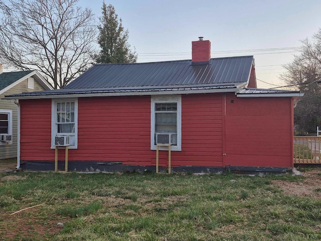 2608 Old Forest Rd, Lynchburg, VA 24501 - view of property exterior with cooling unit, a yard, a chimney, and metal roof