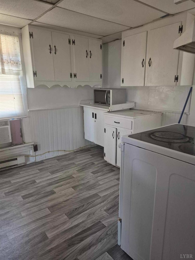 2608 Old Forest Rd, Lynchburg, VA 24501 - kitchen with electric range, stainless steel microwave, under cabinet range hood, and white cabinets