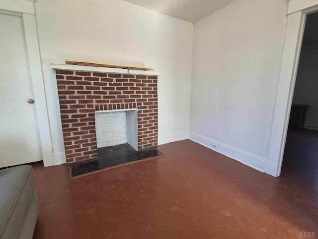 2608 Old Forest Rd, Lynchburg, VA 24501 - unfurnished living room with finished concrete flooring, baseboards, and a fireplace