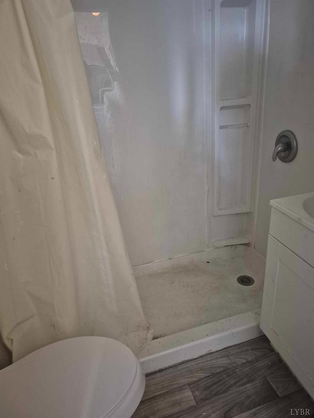 2608 Old Forest Rd, Lynchburg, VA 24501 - full bath with a shower stall, wood finished floors, and vanity