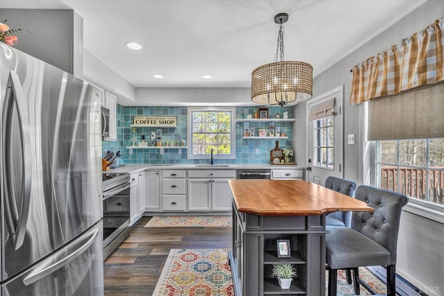 6892 Tolers Ferry Rd, Huddleston, VA 24104 - kitchen with white cabinetry, open shelves, stainless steel appliances, decorative backsplash, and a sink