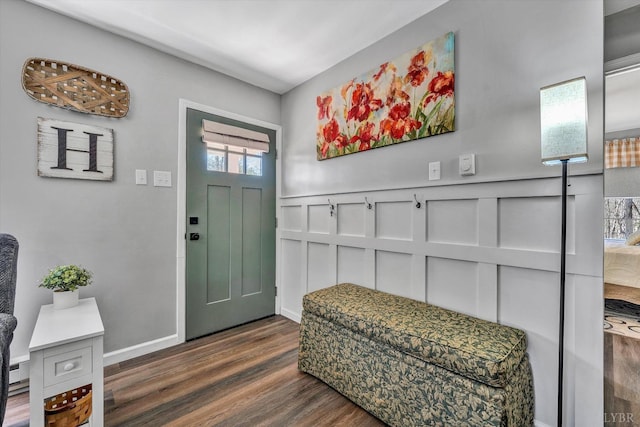 6892 Tolers Ferry Rd, Huddleston, VA 24104 - entrance foyer with a decorative wall, dark wood-style floors, and wainscoting