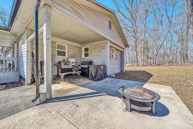 504 Spinnaker Way, Moneta, VA 24121 - view of patio / terrace featuring an outdoor fire pit and area for grilling