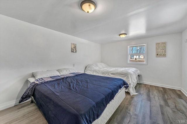 504 Spinnaker Way, Moneta, VA 24121 - bedroom with wood finished floors and baseboards