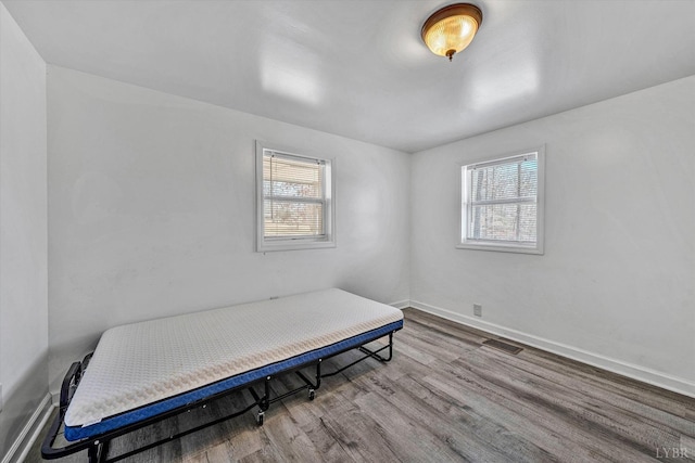 504 Spinnaker Way, Moneta, VA 24121 - bedroom with multiple windows and wood finished floors