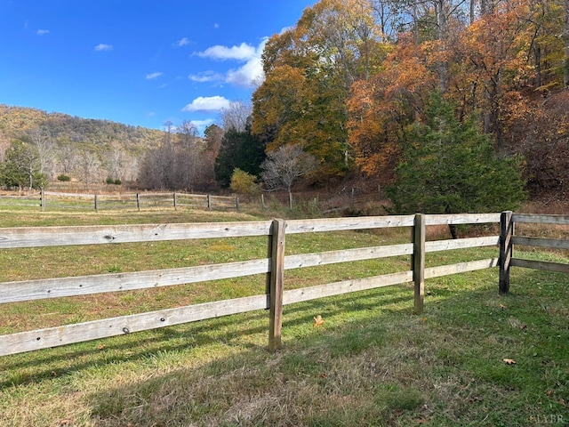 506 Peters Hollow Rd, Monroe, VA 24574 - view of yard with a rural view, fence, and a wooded view