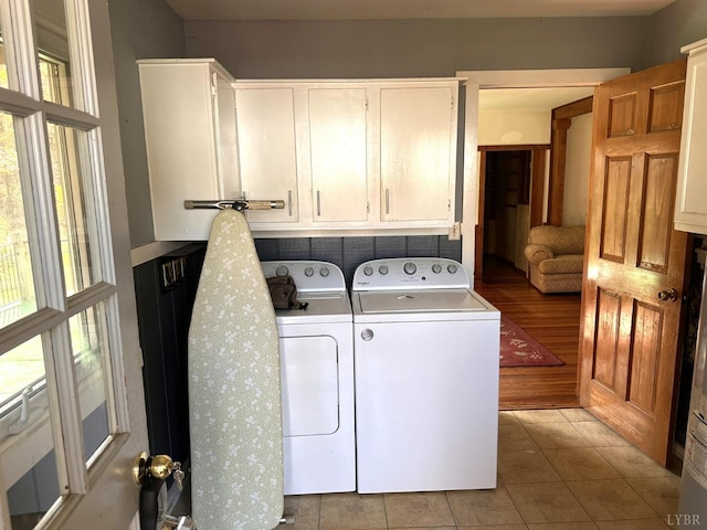 506 Peters Hollow Rd, Monroe, VA 24574 - washroom featuring cabinet space, independent washer and dryer, and tile patterned flooring