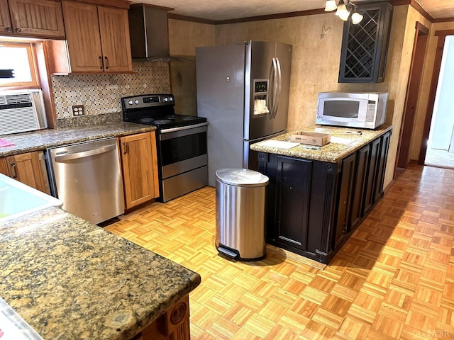 506 Peters Hollow Rd, Monroe, VA 24574 - kitchen featuring brown cabinets, appliances with stainless steel finishes, wall chimney exhaust hood, crown molding, and decorative backsplash