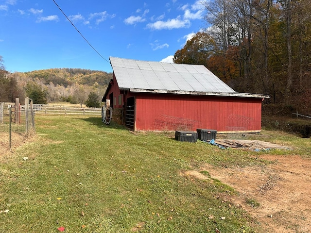506 Peters Hollow Rd, Monroe, VA 24574 - view of outbuilding with an outbuilding, a mountain view, fence, and a wooded view