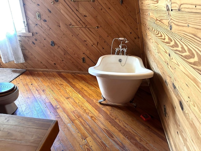 506 Peters Hollow Rd, Monroe, VA 24574 - full bath with toilet, wood walls, wood-type flooring, and a freestanding bath