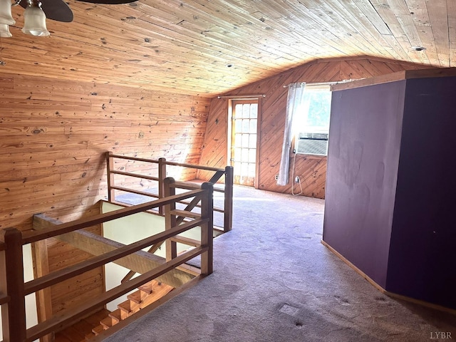 506 Peters Hollow Rd, Monroe, VA 24574 - corridor featuring wood walls, wood ceiling, lofted ceiling, carpet floors, and an upstairs landing