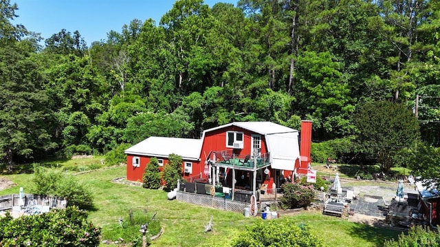 506 Peters Hollow Rd, Monroe, VA 24574 - back of property featuring an outbuilding, a lawn, and a gambrel roof