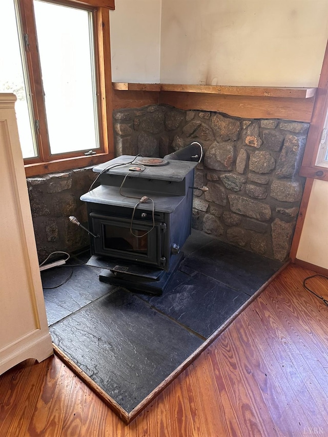 506 Peters Hollow Rd, Monroe, VA 24574 - room details featuring wood finished floors and a wood stove
