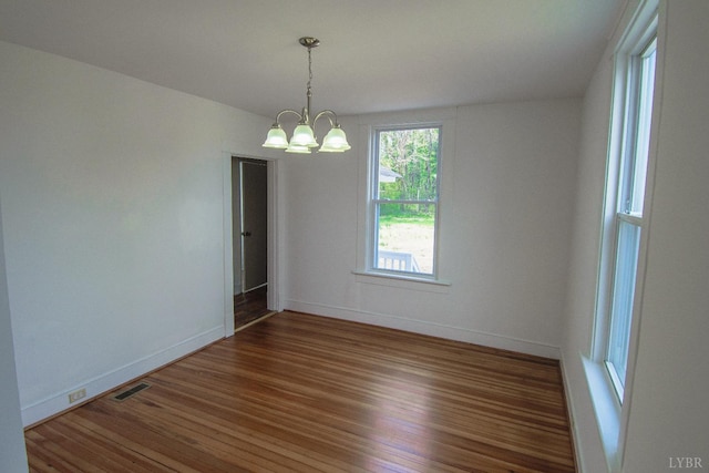 1640 Shaffer St, Lynchburg, VA 24501 - spare room featuring baseboards, wood finished floors, visible vents, and a chandelier