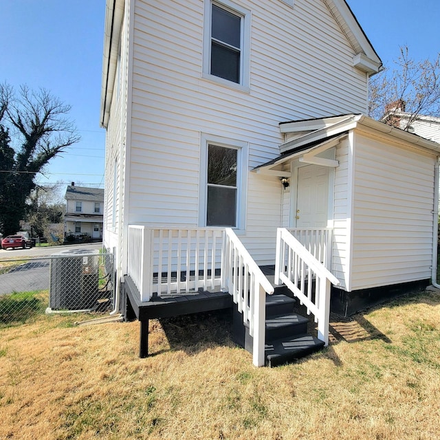1640 Shaffer St, Lynchburg, VA 24501 - back of house with cooling unit, a lawn, and fence