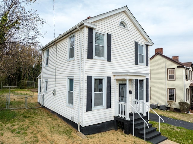 1640 Shaffer St, Lynchburg, VA 24501 - view of front of property with a front yard, central air condition unit, and fence