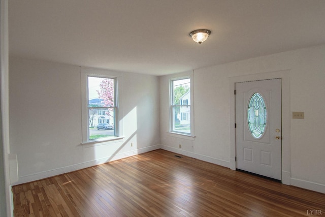 1640 Shaffer St, Lynchburg, VA 24501 - foyer featuring visible vents, wood finished floors, and baseboards