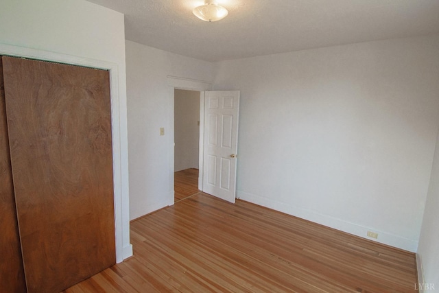 1640 Shaffer St, Lynchburg, VA 24501 - unfurnished bedroom featuring light wood finished floors, baseboards, and a closet