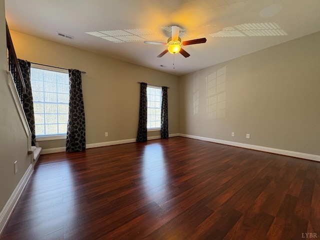 2009 Lakeside Dr Unit 302, Lynchburg, VA 24502 - empty room with healthy amount of natural light, dark wood-type flooring, a ceiling fan, and baseboards