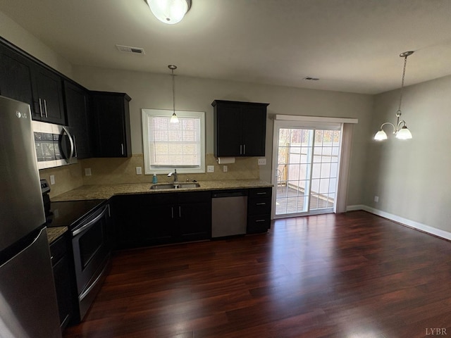 2009 Lakeside Dr Unit 302, Lynchburg, VA 24502 - kitchen featuring stainless steel appliances, a sink, dark cabinets, and plenty of natural light
