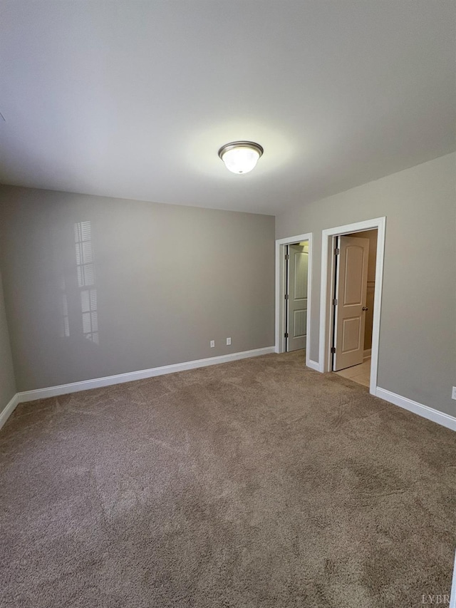2009 Lakeside Dr Unit 302, Lynchburg, VA 24502 - spare room with baseboards and carpet