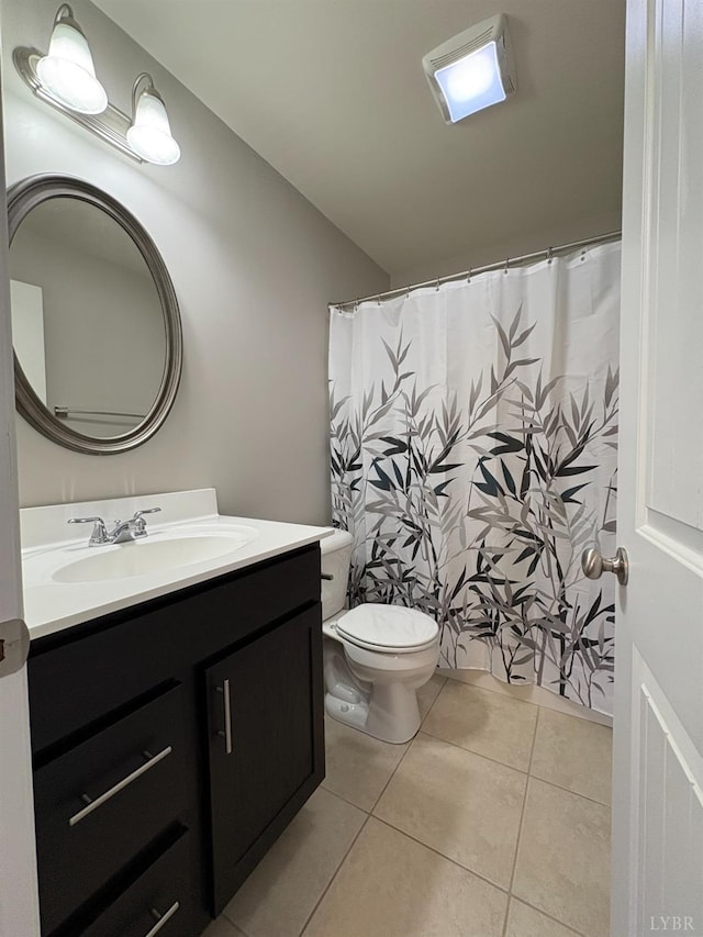 2009 Lakeside Dr Unit 302, Lynchburg, VA 24502 - bathroom featuring vanity, tile patterned floors, and toilet