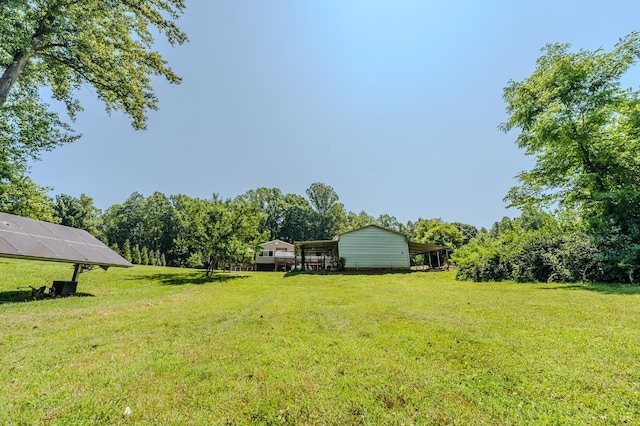 1553 Old Stage Rd, Amherst, VA 24521 - view of green lawn with a detached carport