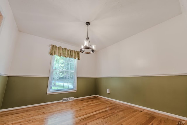 1553 Old Stage Rd, Amherst, VA 24521 - empty room with a chandelier and wood finished floors