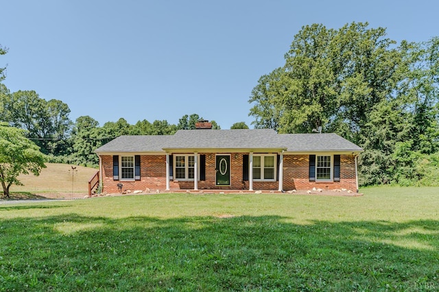 1553 Old Stage Rd, Amherst, VA 24521 - ranch-style home featuring a front yard, a chimney, and brick siding