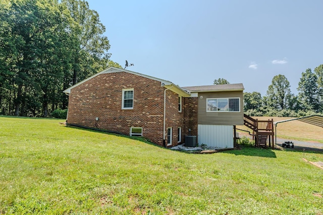 1553 Old Stage Rd, Amherst, VA 24521 - rear view of property featuring stairs, a yard, and brick siding